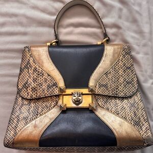 Gucci
Python Medium Osiride Top Handle Bag